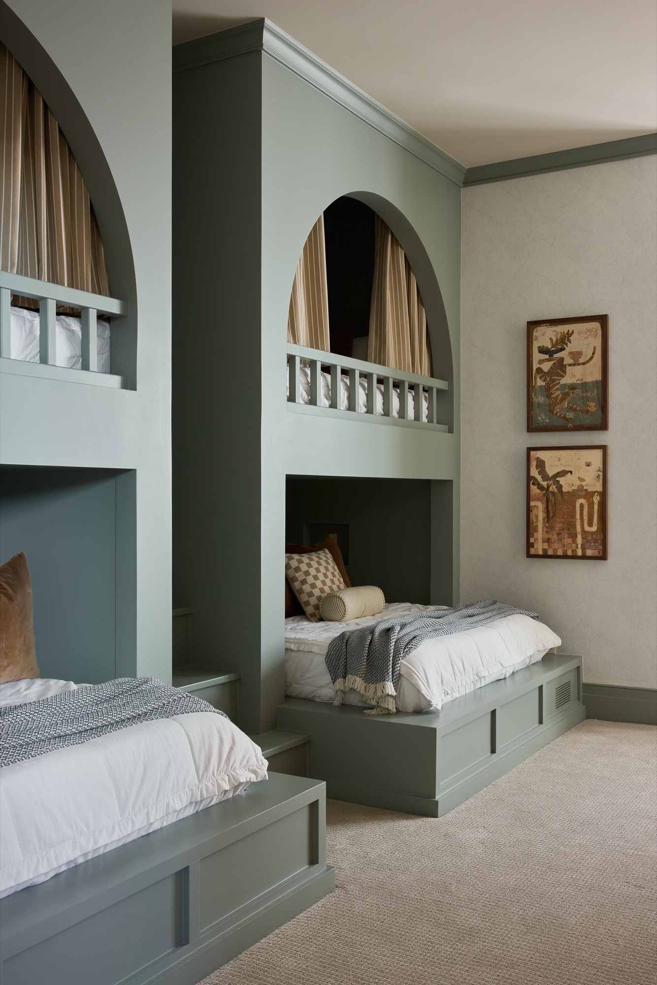 Custom built-in bunk room with painted architectural millwork